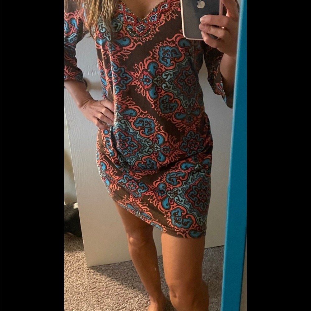 2 dresses joyous and free on multi-color one. Fits like a medium for both.